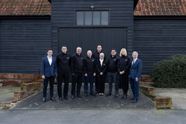 The ICS team outside their offices in Henley, just outside Ipswich